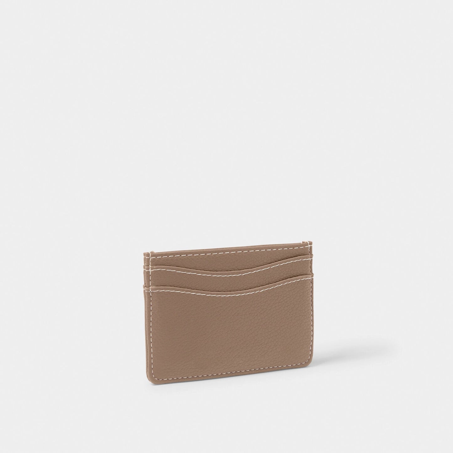 A faux brown leather card holder with contrasting light stitching