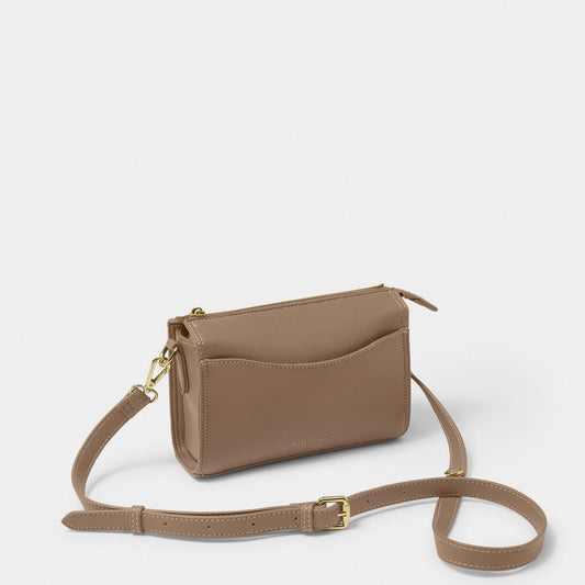 A PU brown leather cross body bag with slip in front pocket and gold zip