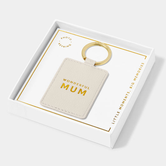 A faux leather off-white keyring featuring the words 'wonderful mum' in gold lettering