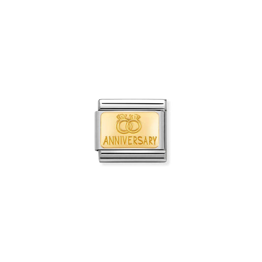 A Nomination charm link featuring a plain gold plaque engraved with the word 'anniversary' and two diamond rings