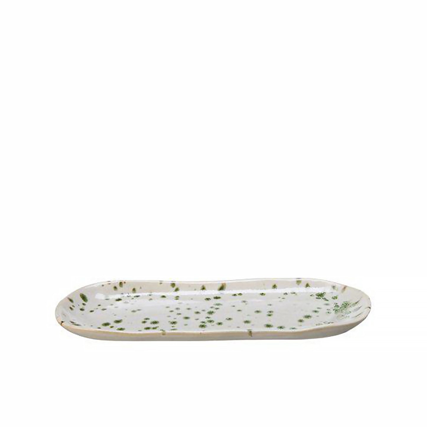 A long rounded plate in off-white with a green splatter pattern