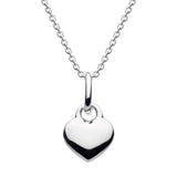 A silver puff heart pendant on a chain