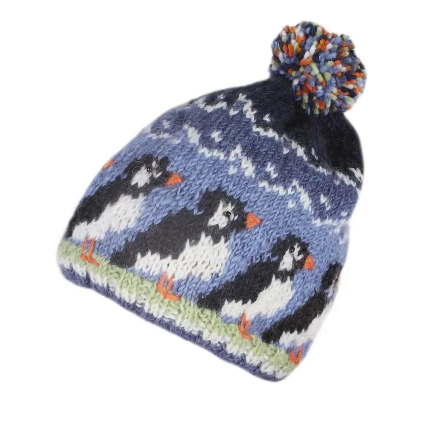 A knitted hat with colourful pompom featuring a design of a row of puffin birds in blue