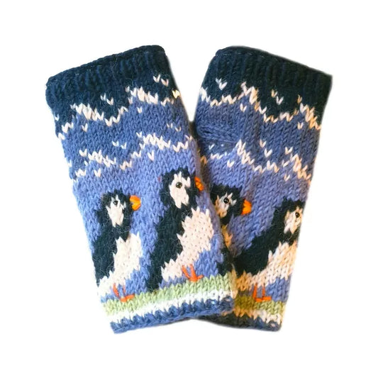 A pair of knitted hand warmers featuring rows of puffins with beaded eyes