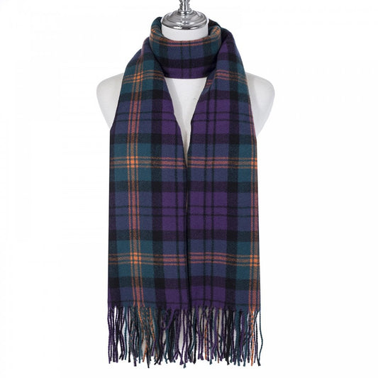 A purple and blue check scarf with fringe trim 