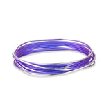 A purple titanium bangle with a wrapped wire design