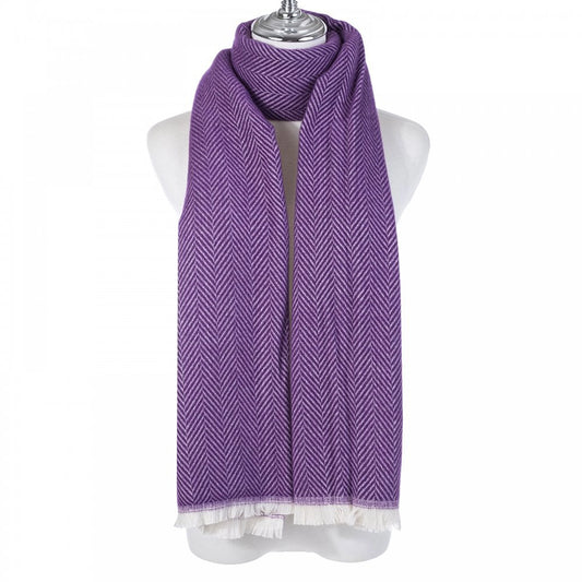 A purple chevron patterned scarf with a white fringe