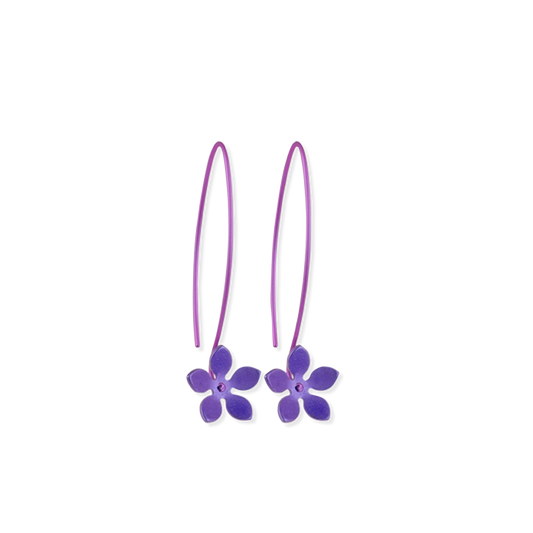 A pair of extra long hook drop earrings with 5 petal flowers on the ends in bright purple titanium