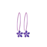 A pair of extra long hook drop earrings with 5 petal flowers on the ends in bright purple titanium