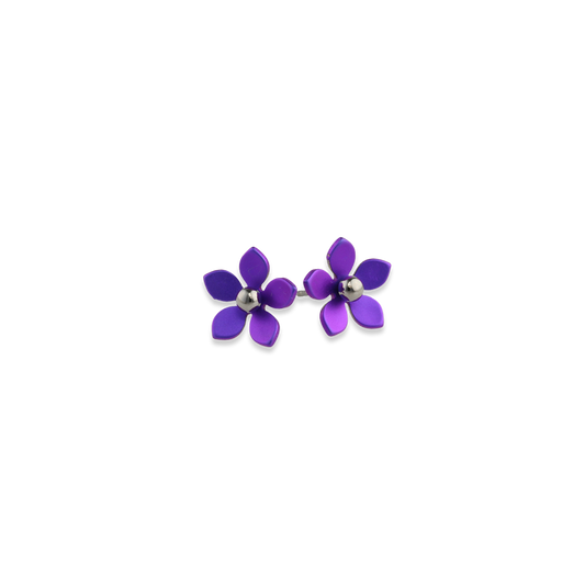 A pair of stud earrings featuring purple 5 petal flowers with polished titanium bead centres