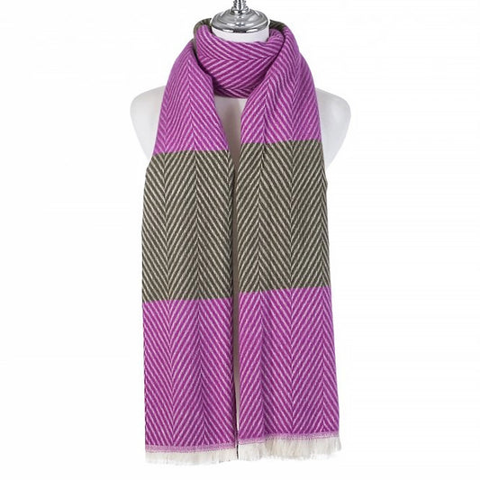 A chevron scarf with colour block pattern in purple and green and a white tassel trim