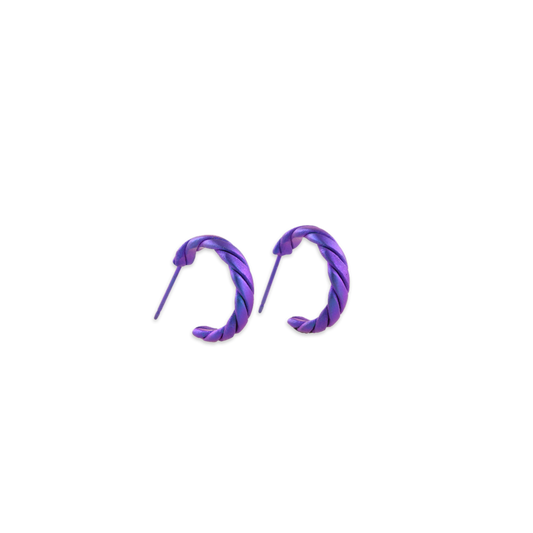 A pair of simple twist design titanium hoop earrings in a purple colour