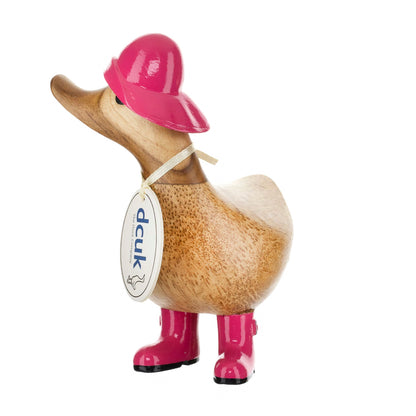 Wooden duck collectible figure in pink rain hat and boots