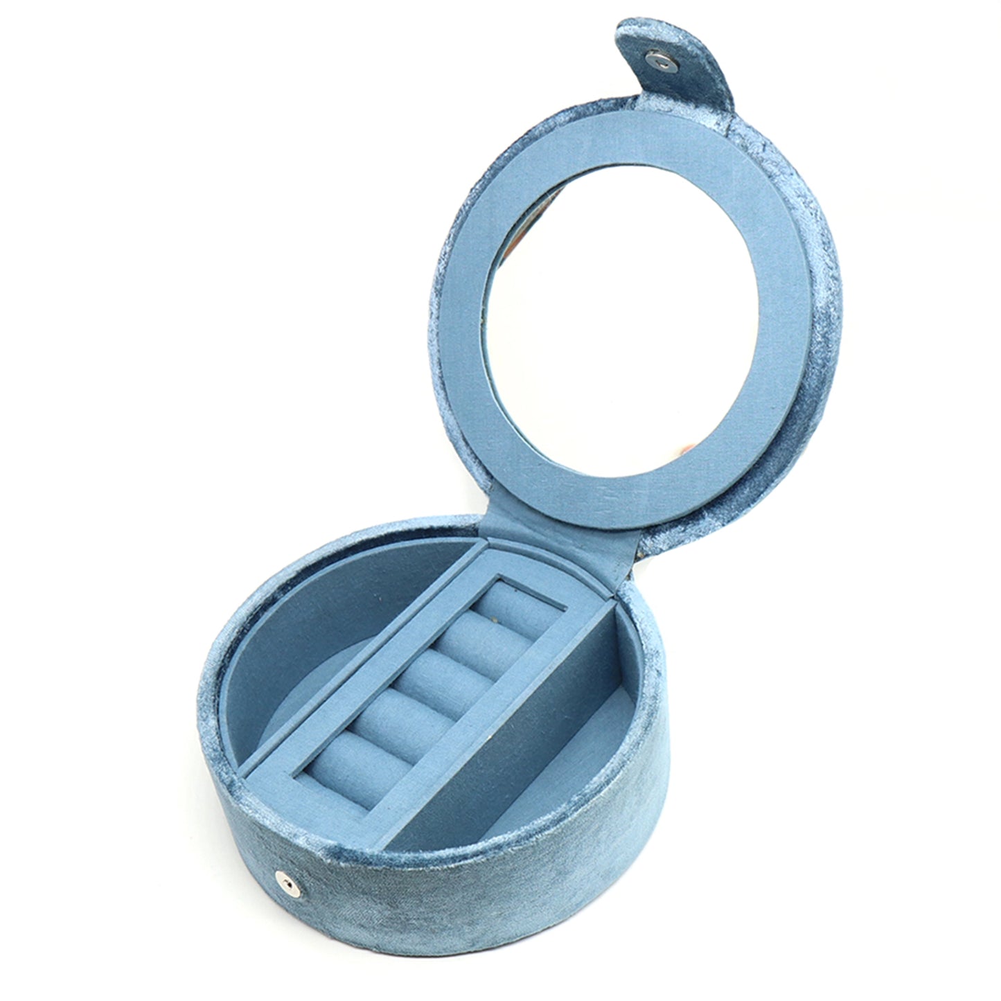 A round dusky blue velvet jewellery box with two open compartments and a ring roll