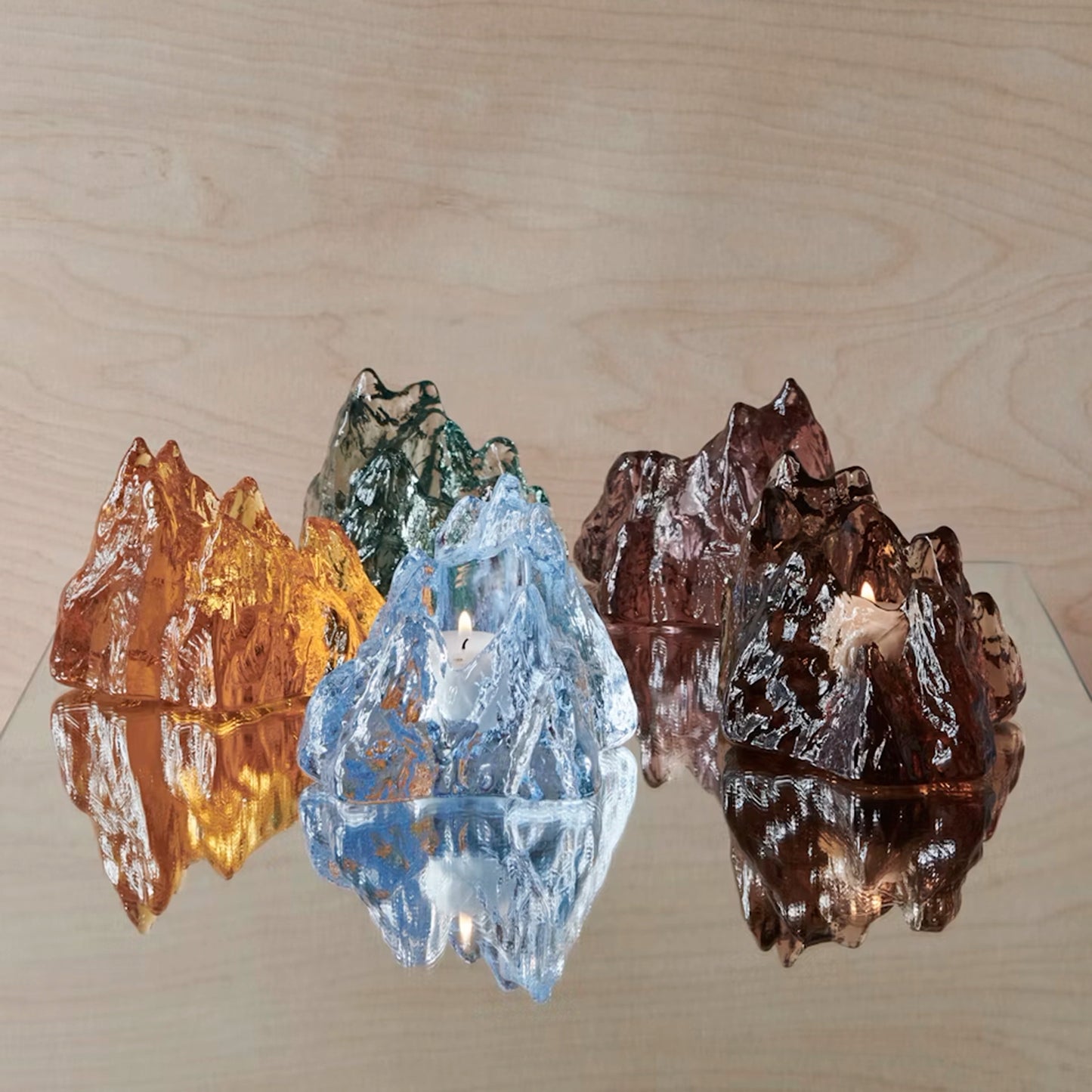 Jewel toned glass rock shaped tealight holders lifestyle