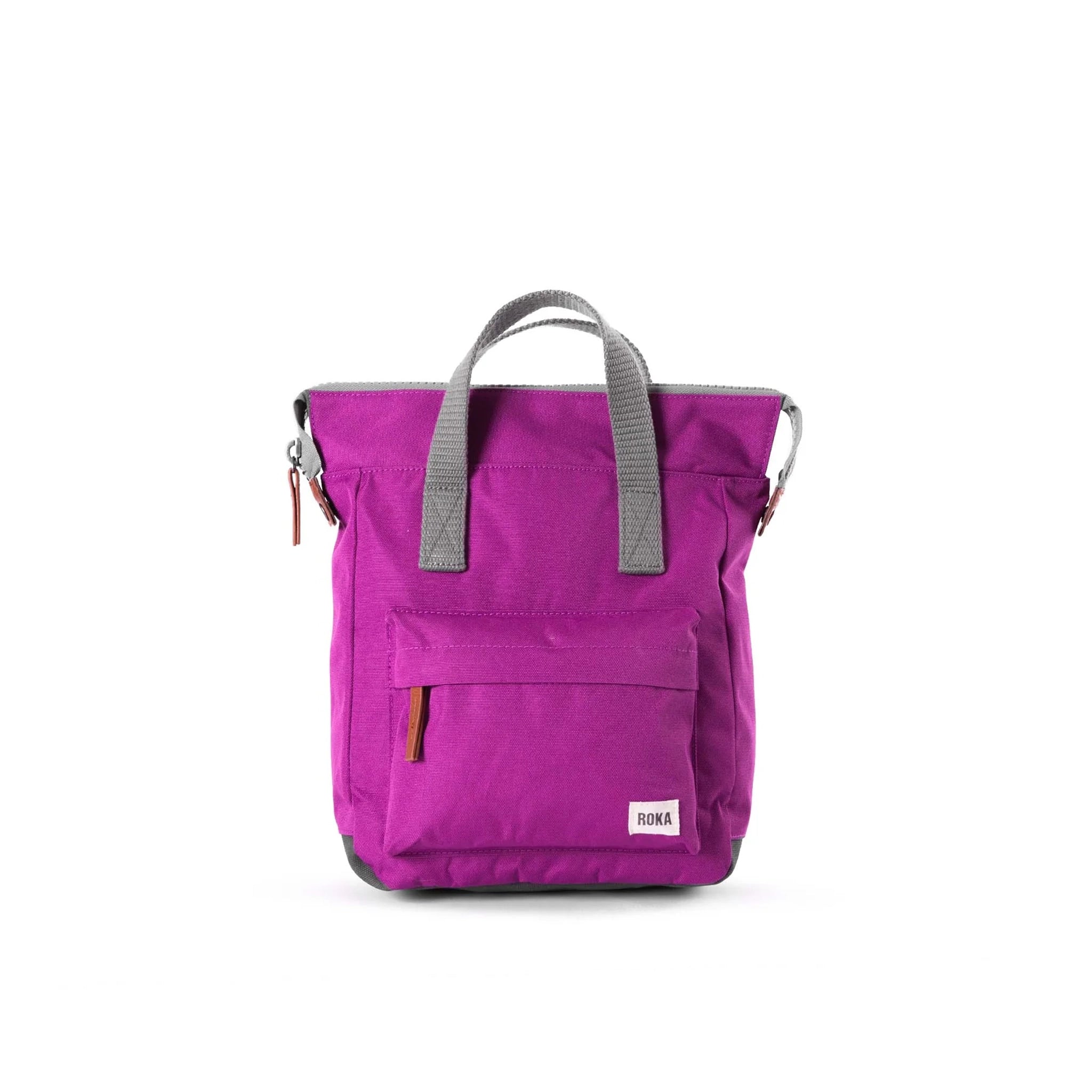 A canvas backpack in a violet purple colour with grey handles and front zip pocket