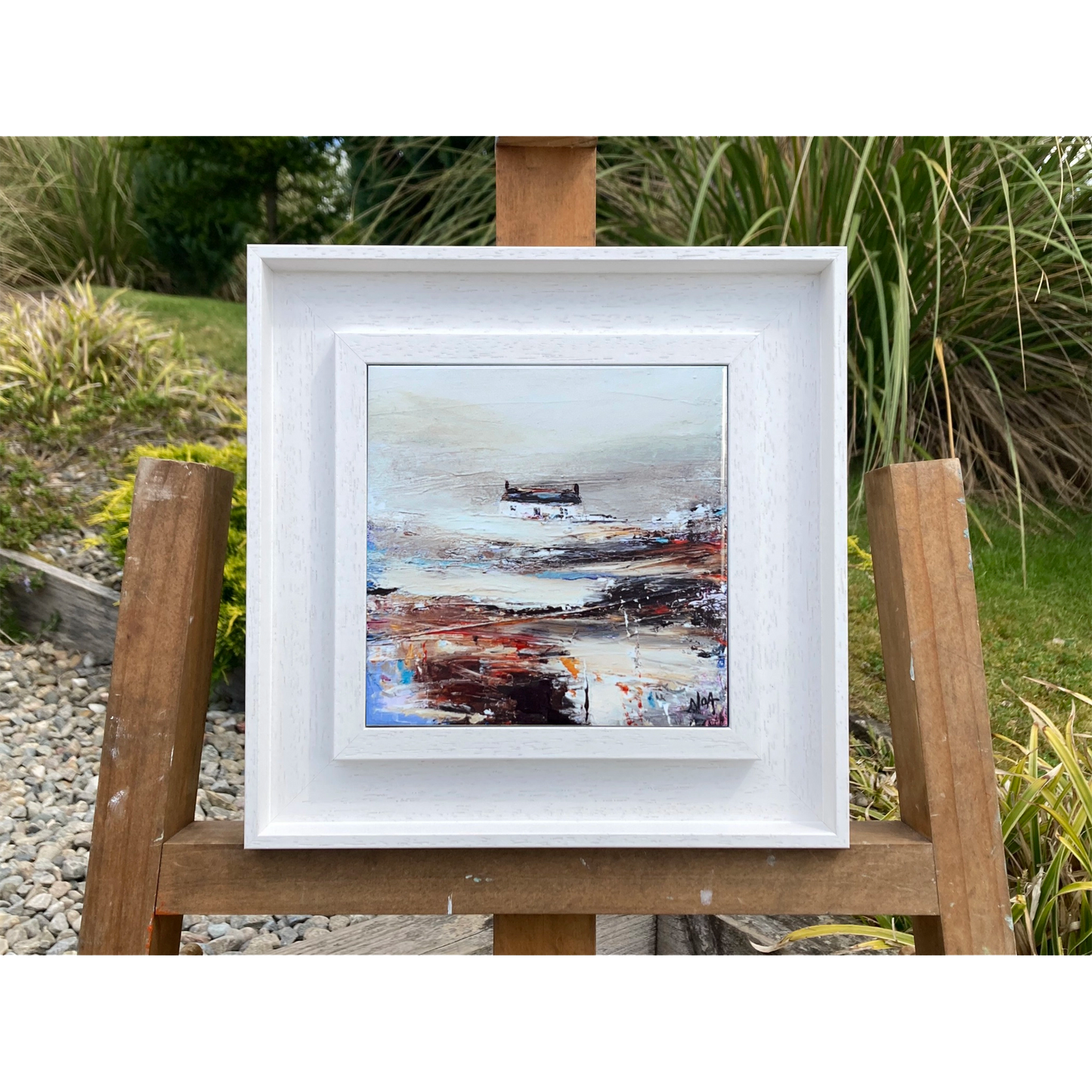 White framed tile art print featuring a white bothie on an abstract field in a mix of hues