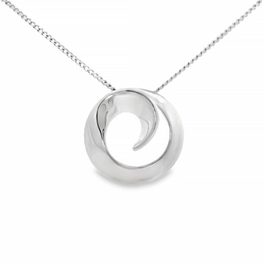 A silver pendant shaped like an ocean wave