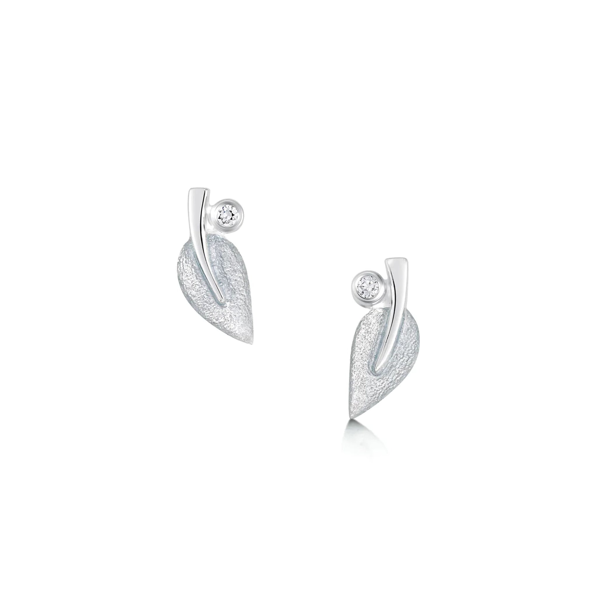 Silver stud earrings in the shape of rowan tree leaves, in frosty white enamel and with a cubic zirconia