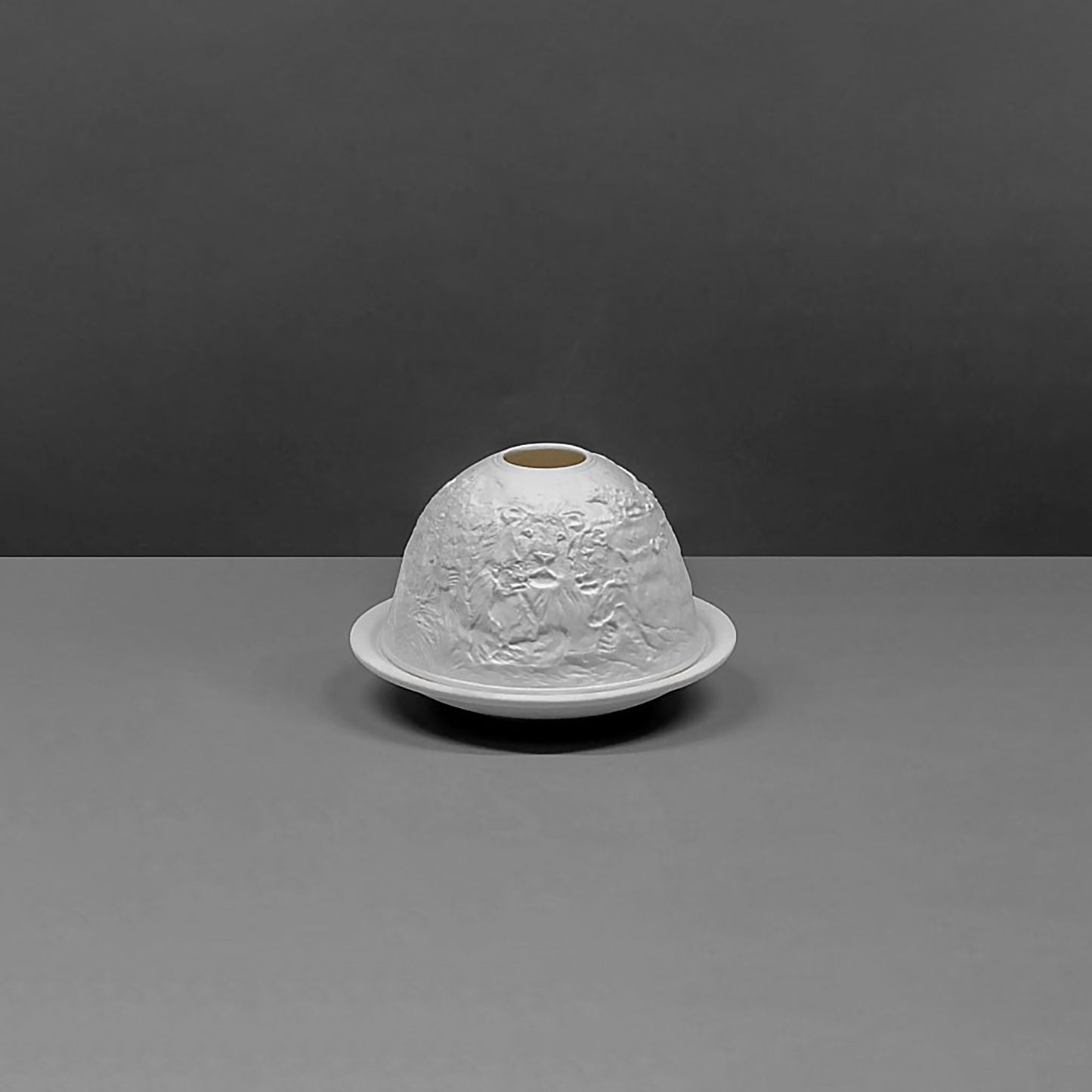 White porcelain dome candle holder with a safari scene