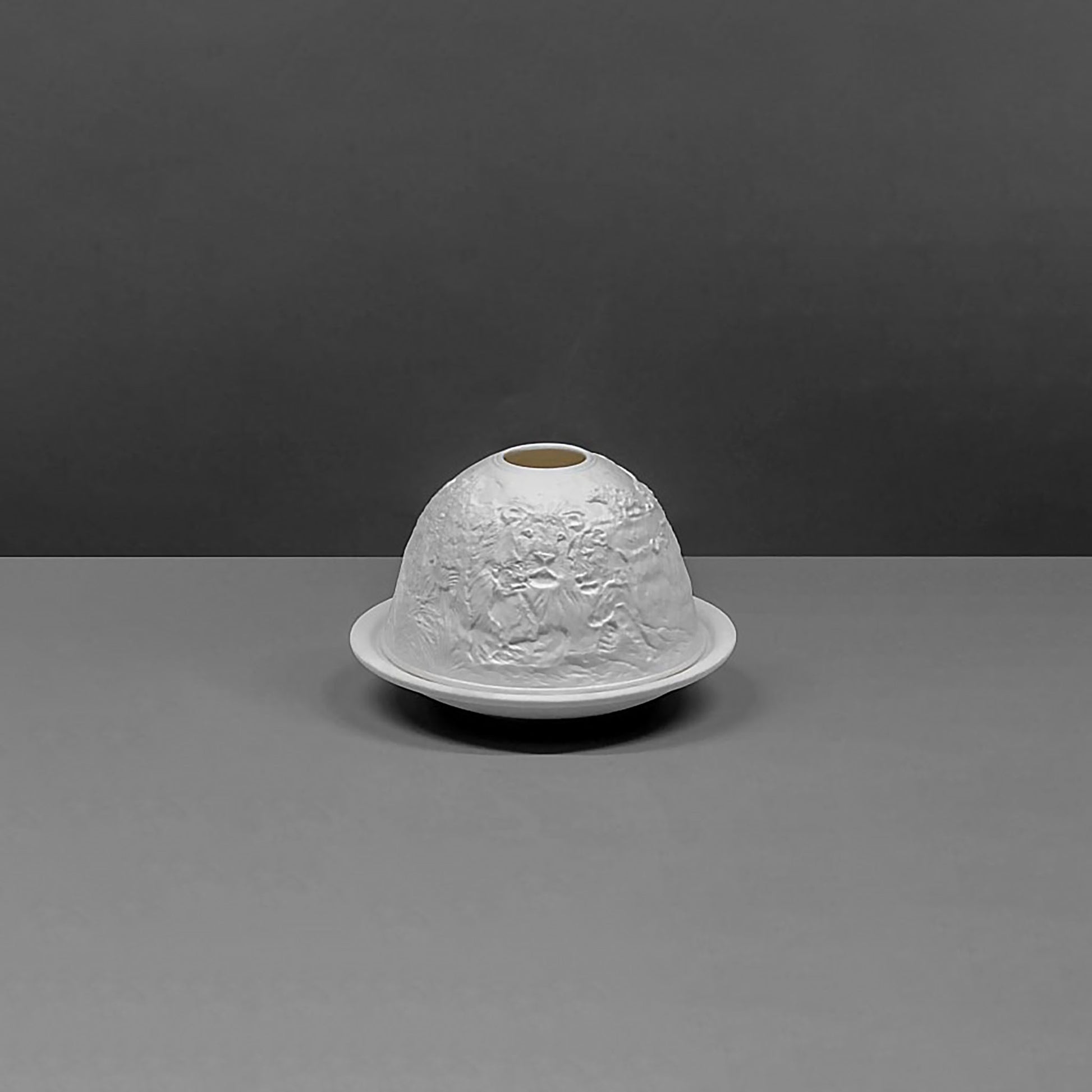 White porcelain dome candle holder with a safari scene