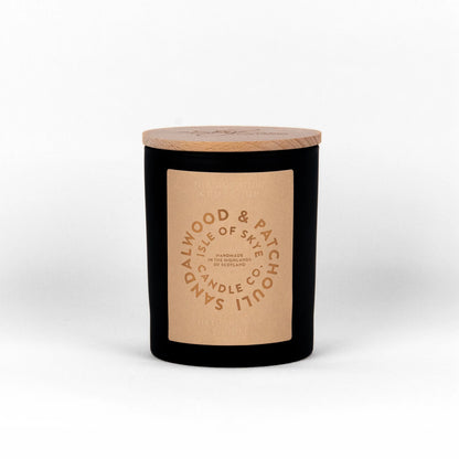 Black tumbler candle in sandalwood and patchouli scent
