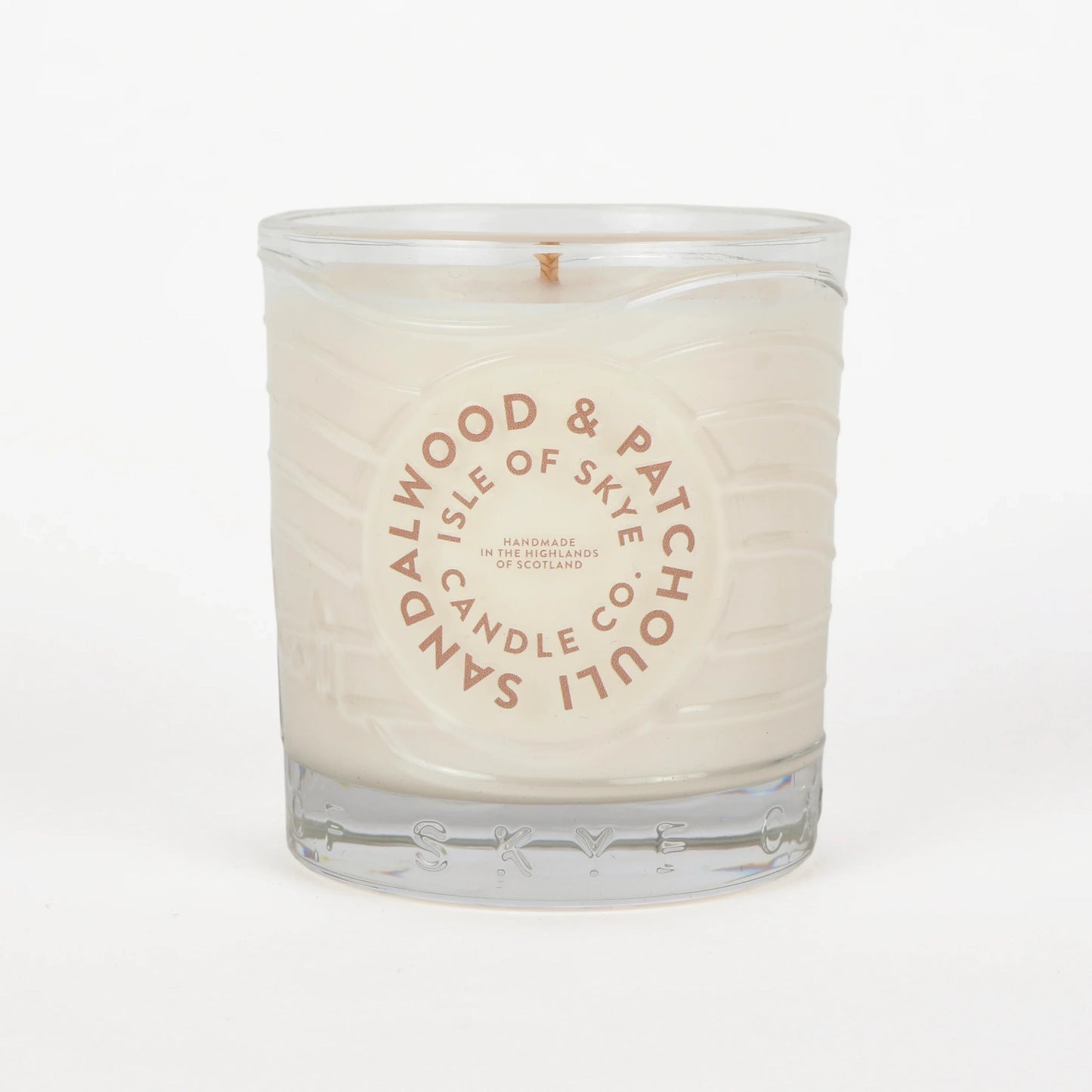 Sandalwood and patchouli scented candle in glass tumbler 