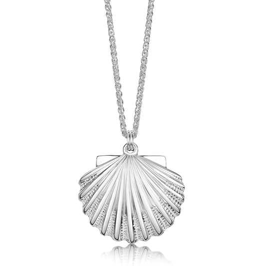 A silver pendant shaped like a scallop shell with intricate details and a silver chain