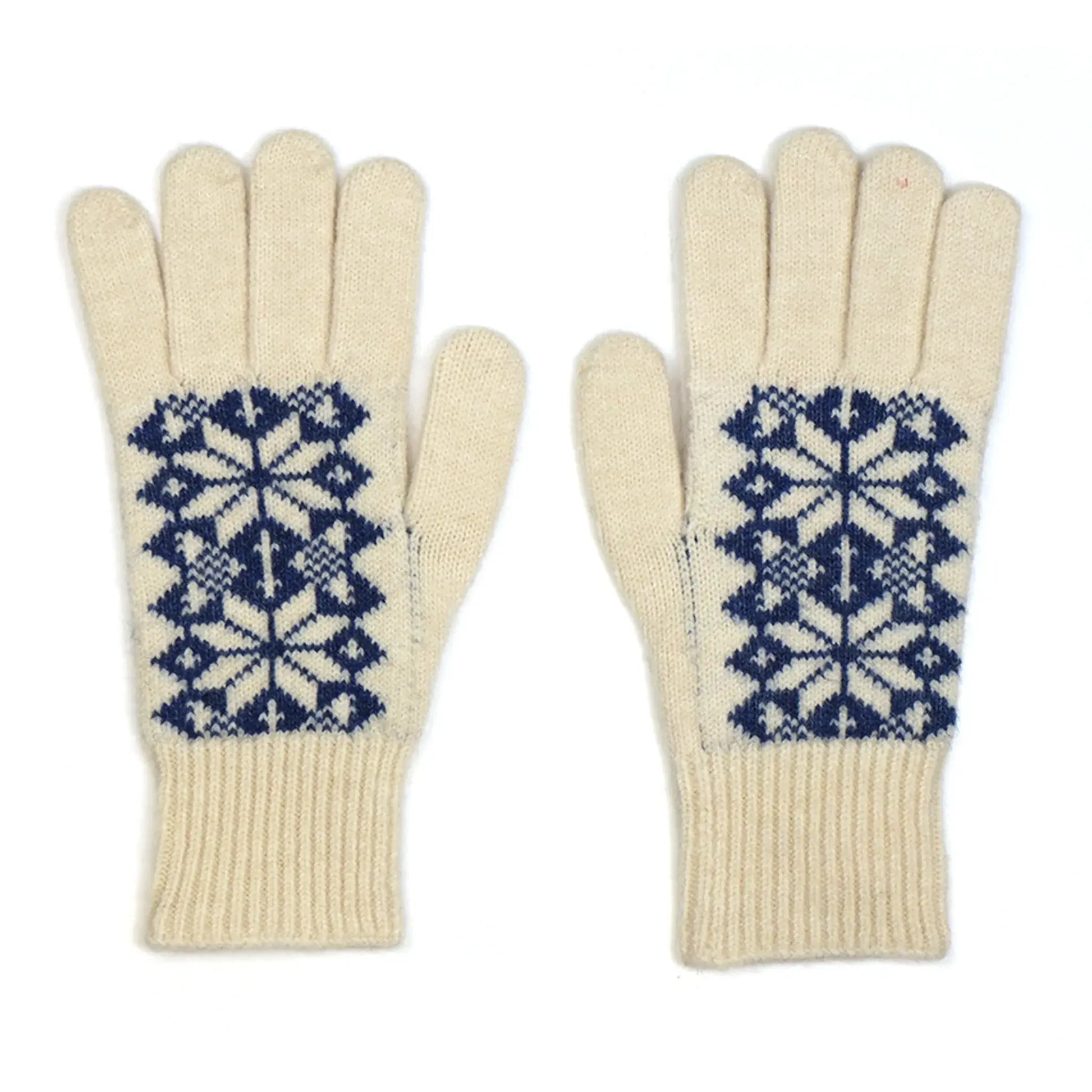 Pair of cream knitted gloves with a Scandi inspired floral design in navy blue