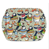 A small scatter dish tray with a design of puffins in woolly knitted jumpers