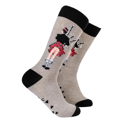 Scottish socks in grey with piper in a kilt showing off his bum