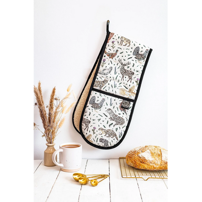 Cotton oven mitts with a Scottish wildlife design and black trim