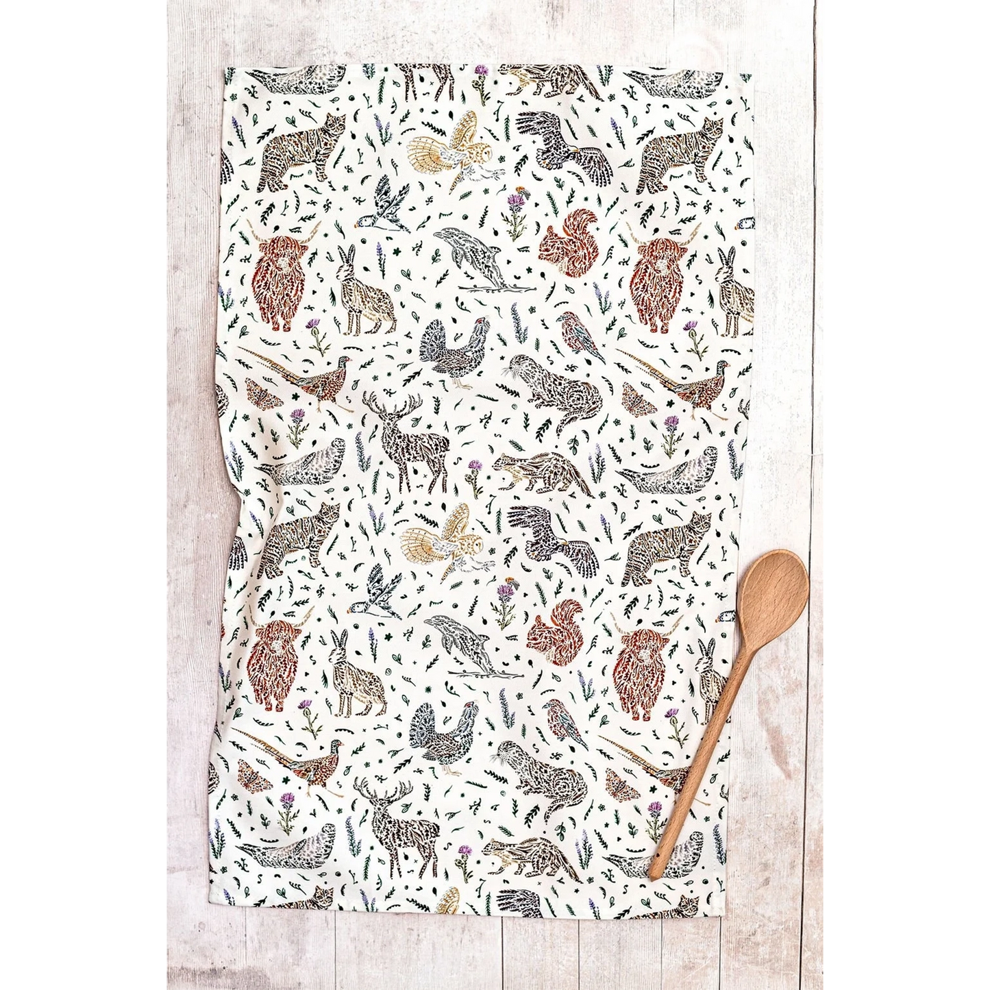 White cotton tea towel with Scottish wildlife design in florals