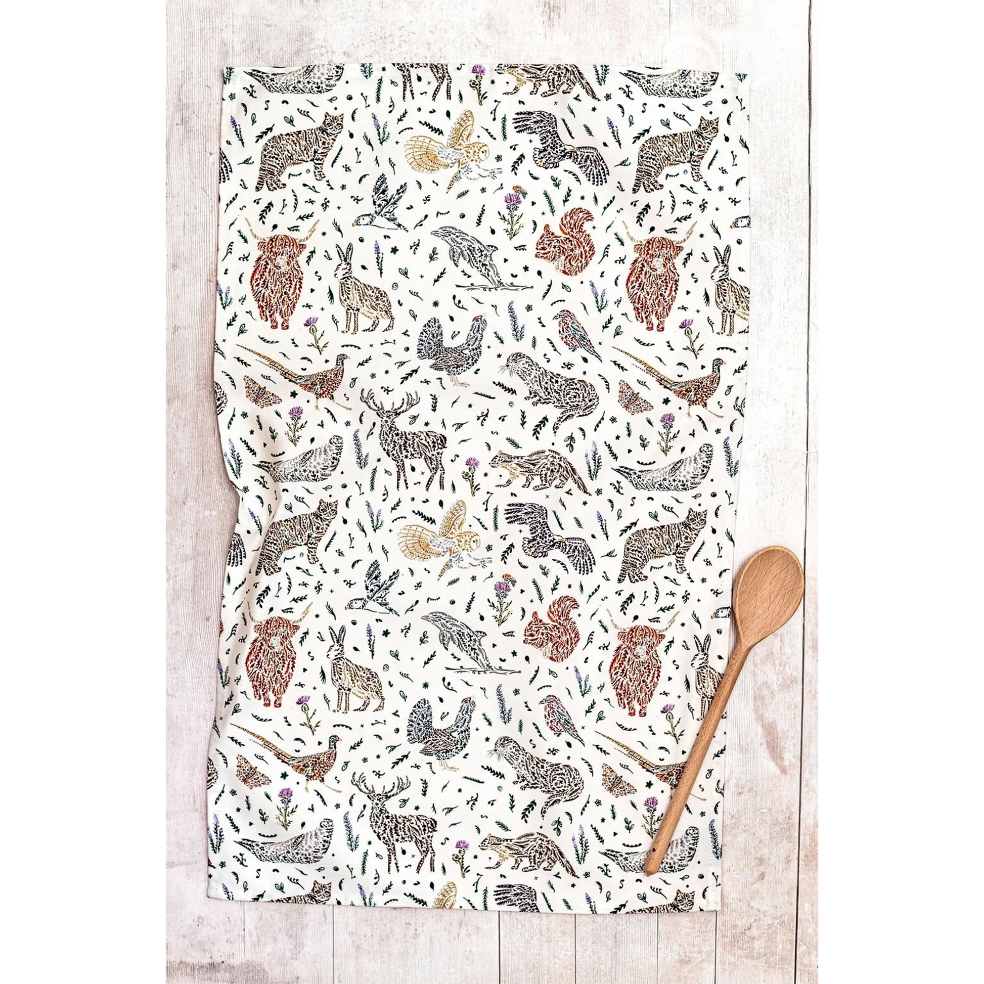 White cotton tea towel with Scottish wildlife design in florals