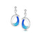 Silver drop earrings with bright blue enamel in a simple abstract ocean wave shape on a drop post fittings