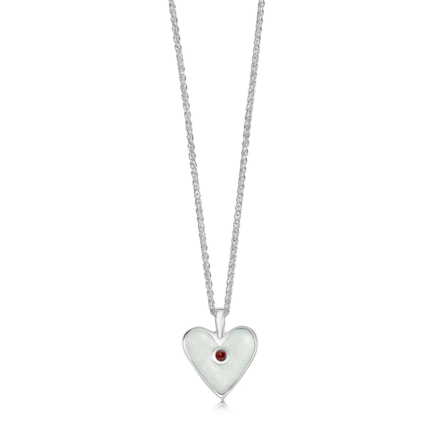 Heart shaped silver pendant in white enamel with a red garnet stone in the centre and a silver chain