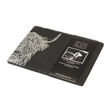 Two slate placemats with engraved Highland cow and packaging sleeve