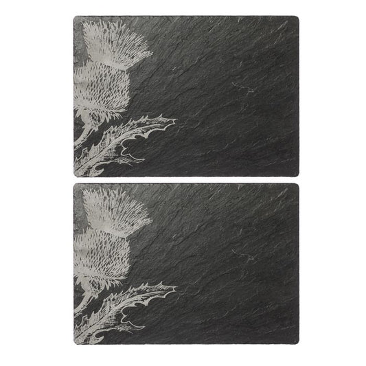 Two slate placemats with engraved Scottish thistle