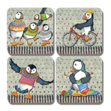Four square coasters featuring puffins in winter jumpers and cycling, and knitting
