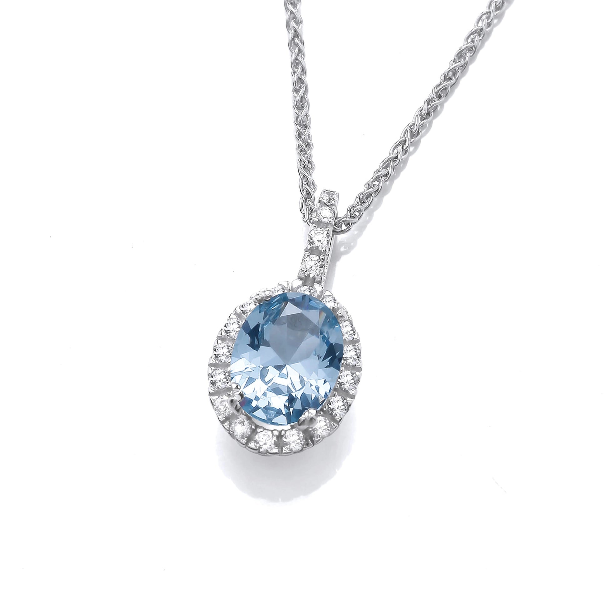 A silver pendant featuring an oval faceted blue cubic zirconia in the centre