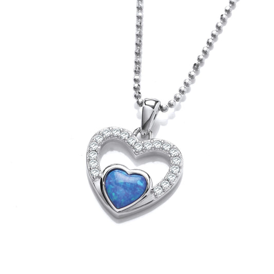 A silver open heart pendant set with CZ stones and a blue opalique heart stone at the point