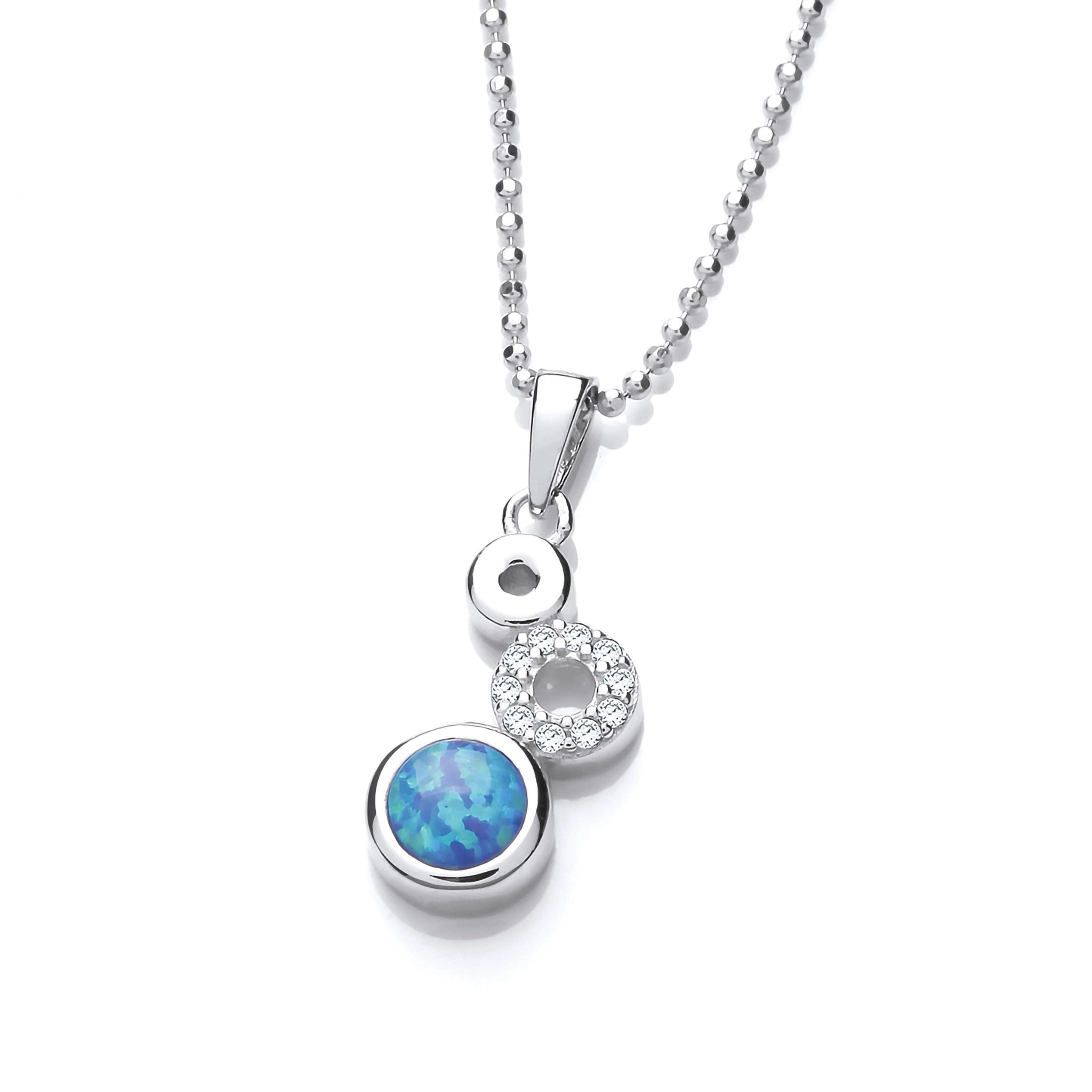 A pendant featuring three silver circles with cubic zirconia and blue opalique stones