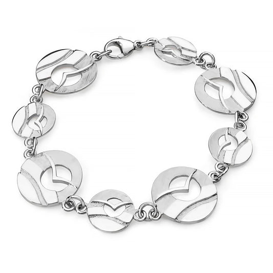 A silver bracelet featuring 8 round links with a flying sea bird in front of a cutout sun over water