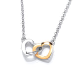 Necklace featuring two linked hearts, one gold plated and one silver