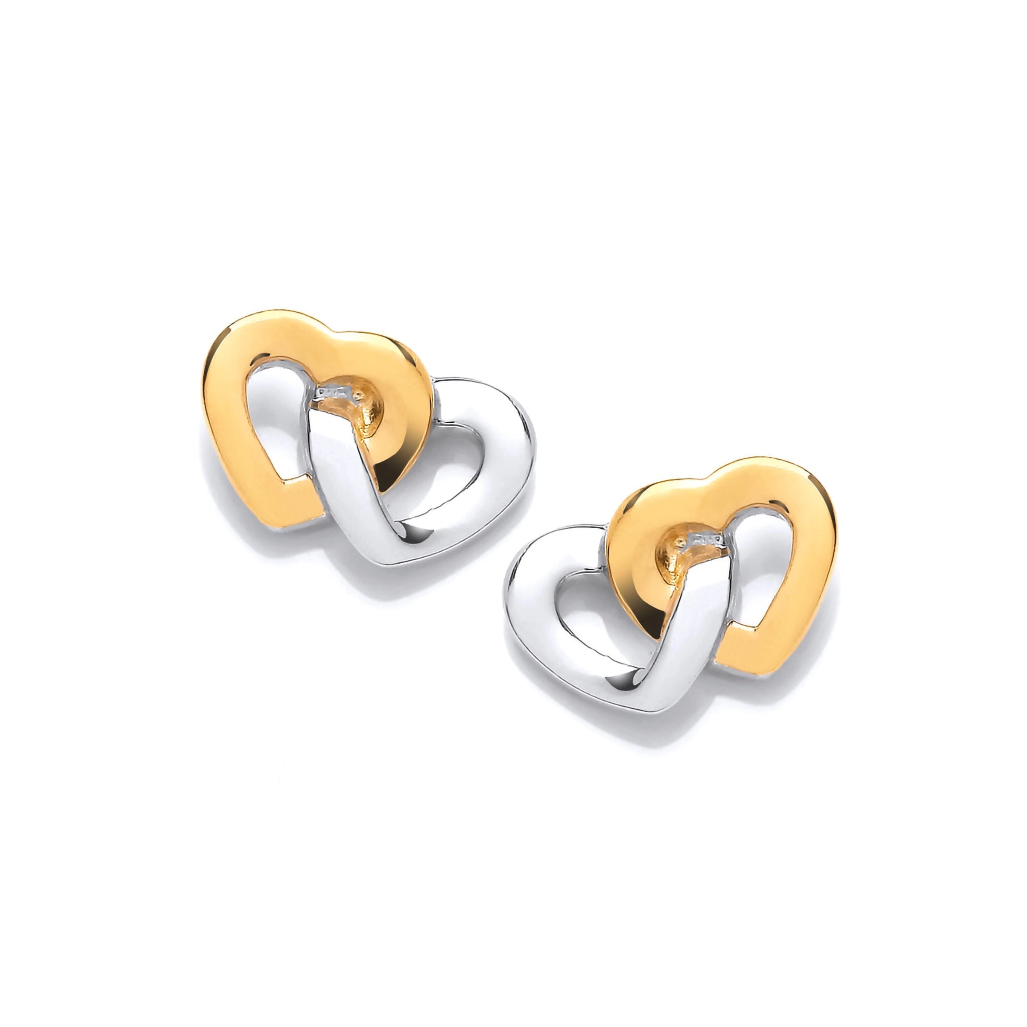 A pair of studs featuring two linked hearts, on in gold and one in silver
