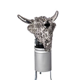A wine pourer with silver Highland cow head on a bottle