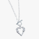 Necklace featuring a textured heart pendant with a T-toggle clasp at the front