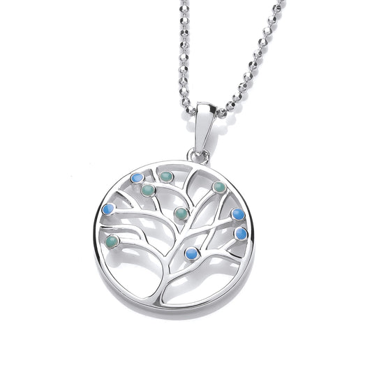 A simple round pendant with a tree of life and blue and green round opals for leaves