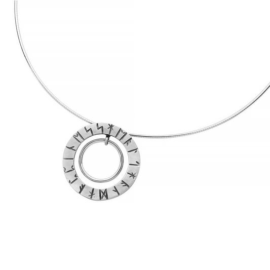 A silver wire necklet with a shiny inner circle and an outer circle engraved with runes