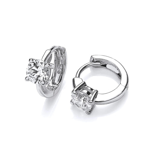 A pair of simple silver huggie hoop earrings with a single solitaire CZ stone